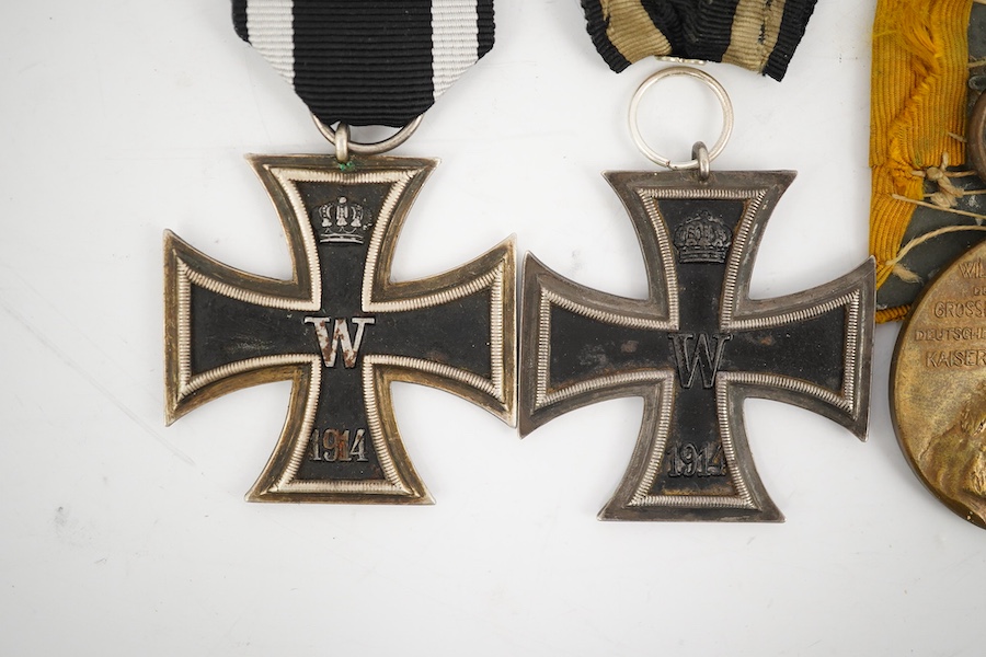 Five German WWI medals; two Second class Iron Crosses, two Kaiser Wilhelm Centenary medals and an Honour Cross 1914-1918. Condition - fair.